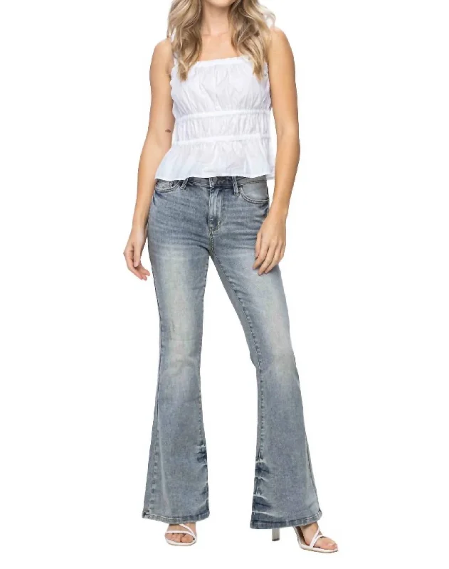 Weekend Deals You Can't Resist Mid Rise Tinted Pin Tack Detailed Flare Jean In Light Wash